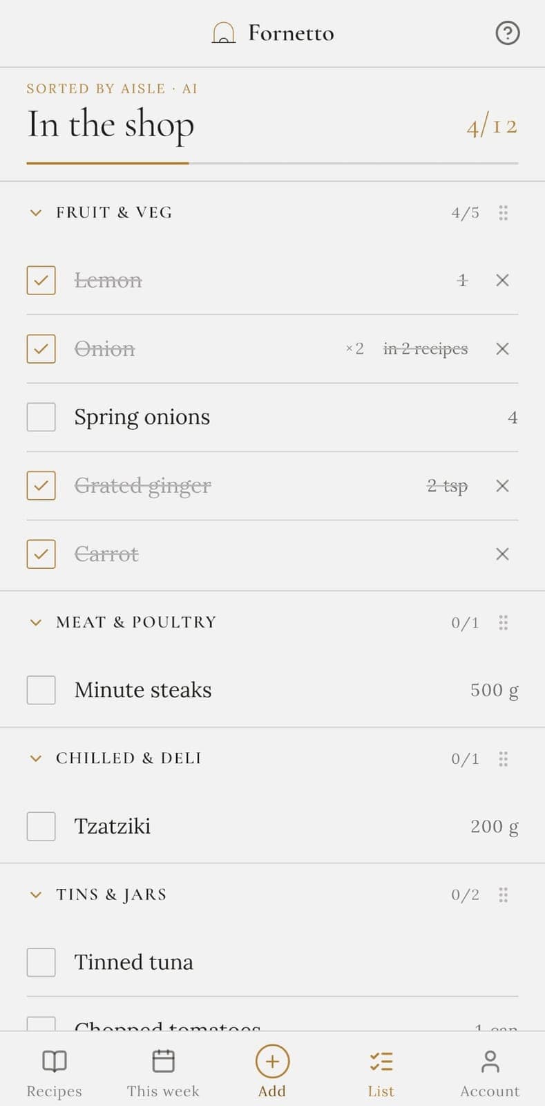 Shop mode on a phone: the shopping list sorted into supermarket aisles, with items ticked off